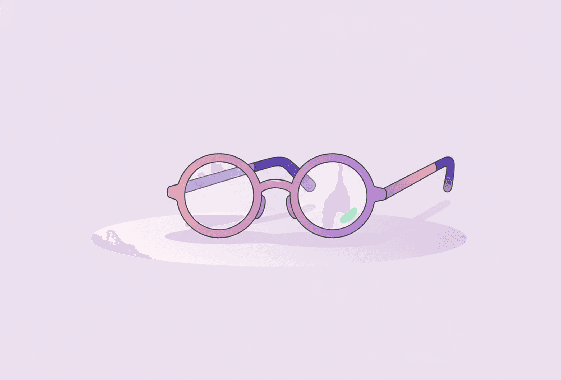 Une paire de lunettes rondes pliées sur une surface vide dans une douce flaque de lumière, la version calme du moment où l'on s'installe pour lire.
