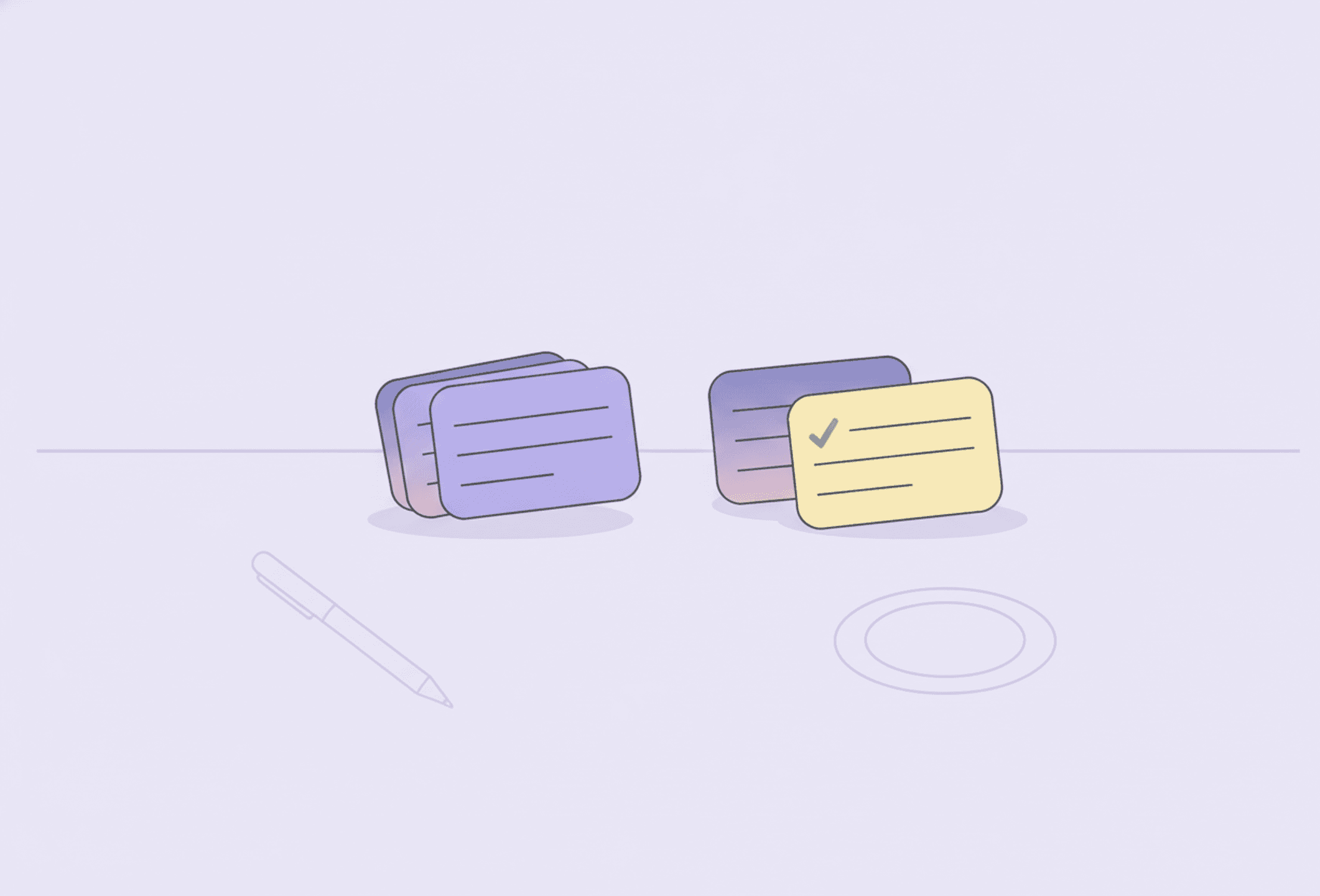 A small stack of blank note cards on a desk with two cards moved aside into a separate pile, one card ticked.