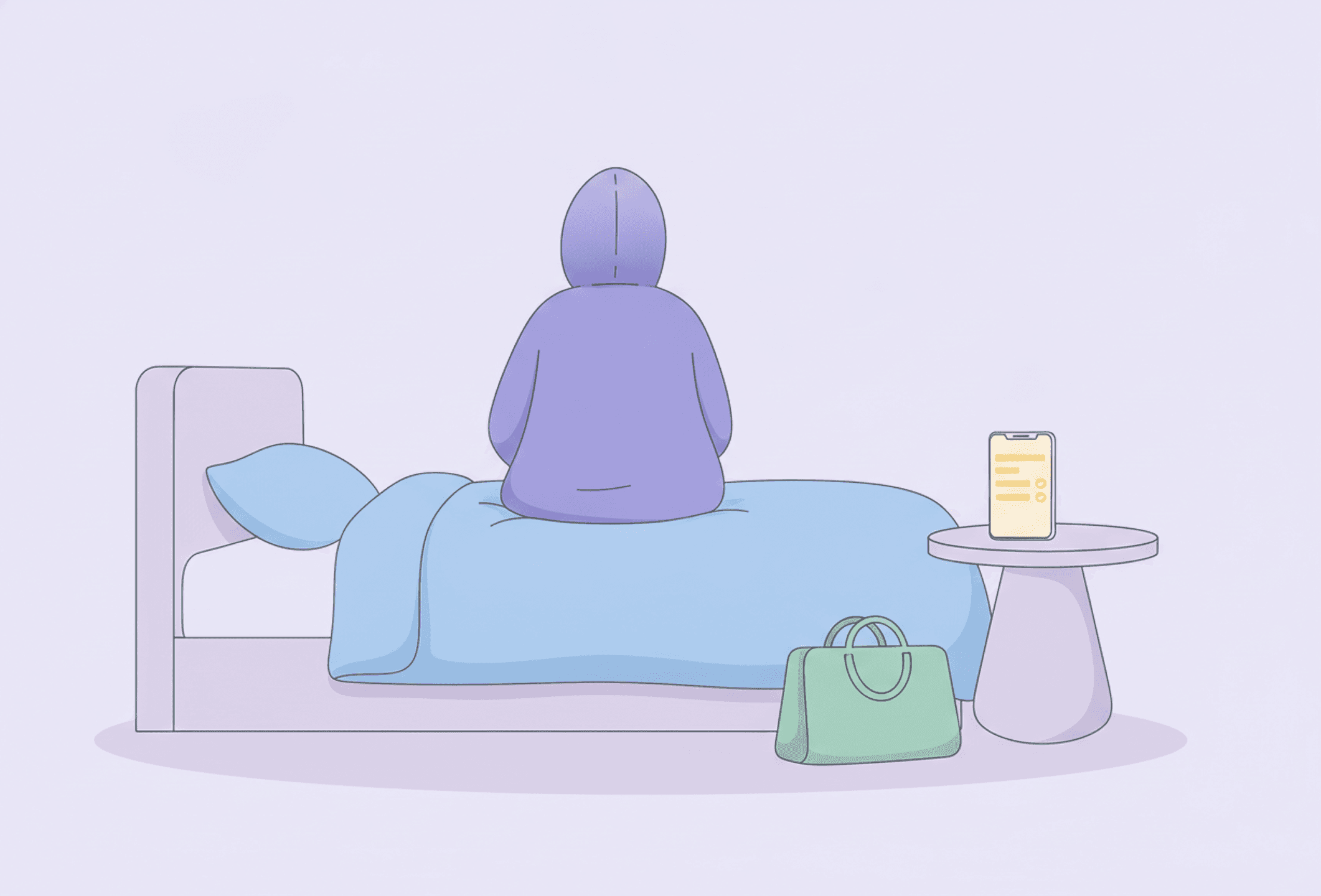 A person sitting on a made bed with their coat still on, seen from behind, a bag on the floor and a phone on the bedside table.